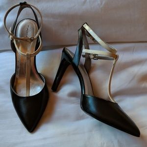 Tahari ankle strap black patent leather pumps.